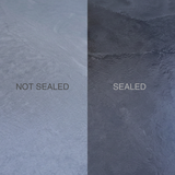 Sealed versus unsealed black slate hearth, side by side, showing the deeper tone after sealing